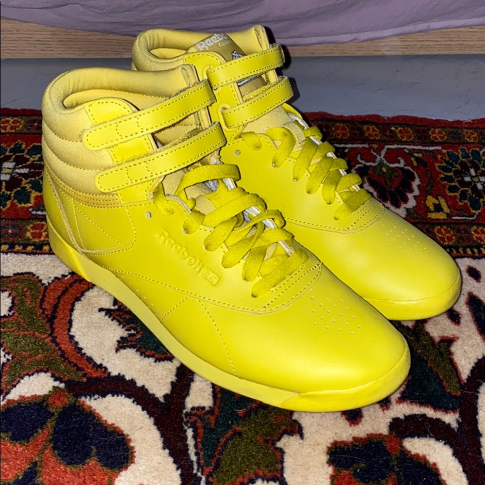 Bright yellow Reebok classics